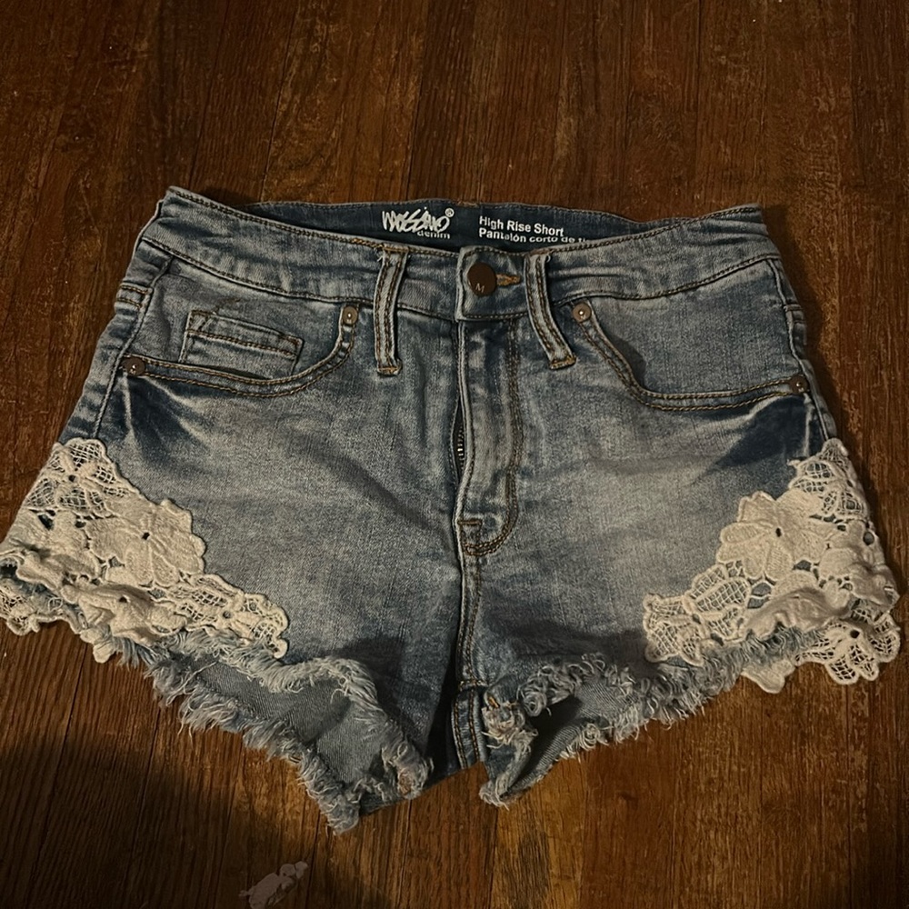 high rise jean shorts with design at the bottom